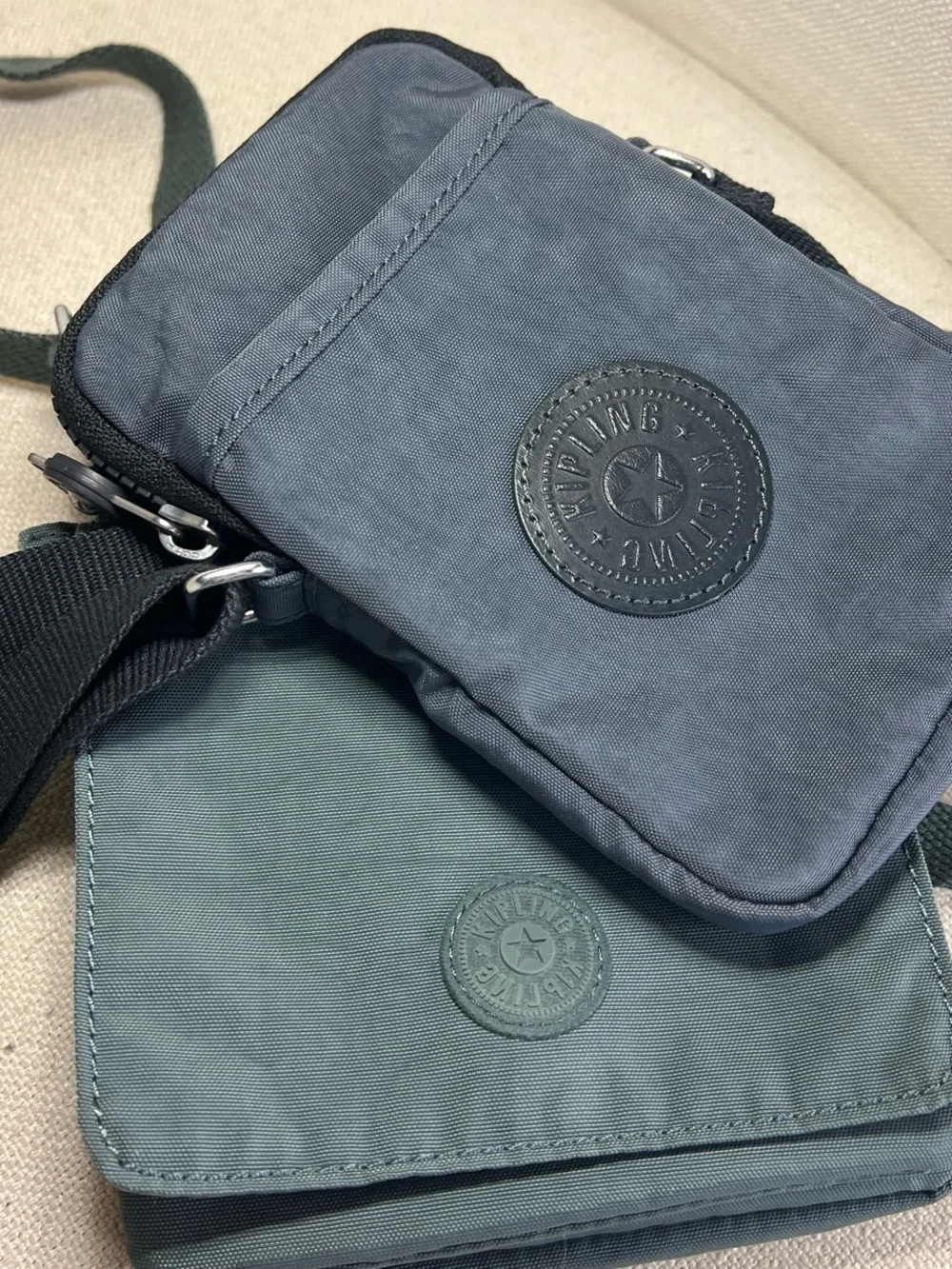 Kipling Dual Mini Crossbody Bags in blue and Green
